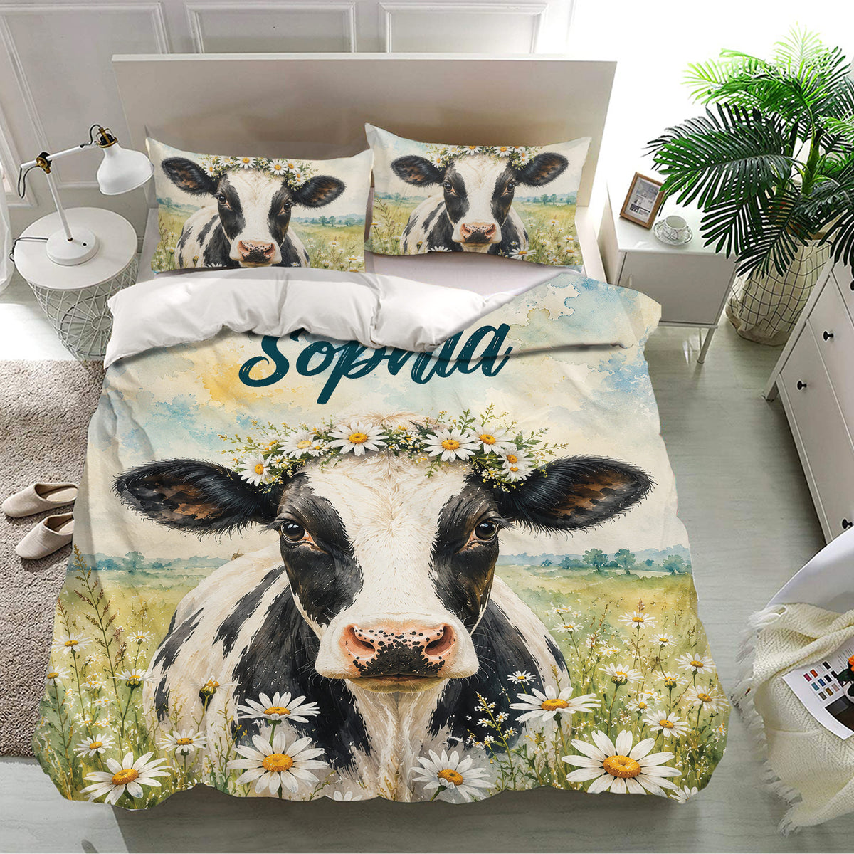Dairy cow bedding set styled in a modern bedroom with watercolor daisies and countryside scenery
