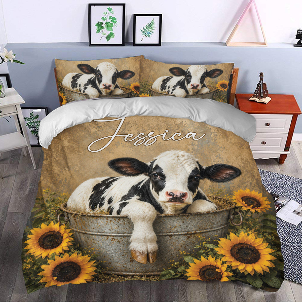 Dairy cow duvet cover bedding set styled in a bedroom with rustic calf and sunflower artwork