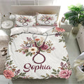Floral nurse duvet cover set displayed on a bright bedroom bed with matching pillowcases