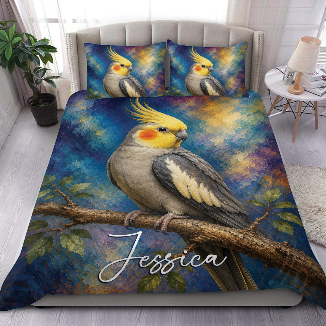 Cockatiel duvet cover set displayed on a bed with painterly blue, gold, and teal bird artwork