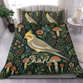 Cockatiel duvet cover set with botanical foliage, mushrooms, and a custom name detail in deep teal