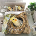 Cockatiel duvet cover bedding set presented in a bright bedroom with watercolor bird and tree imagery