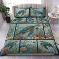 Turtle duvet cover set displayed on a bed with sea turtles, coral, shells, and ocean blue artwork