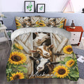 Goat duvet cover styled in a bedroom with rustic barn doors, sunflowers, and matching pillows