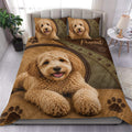 Labradoodle duvet cover set displayed on a bed with a curly dog portrait, paw prints, and rustic brown tones