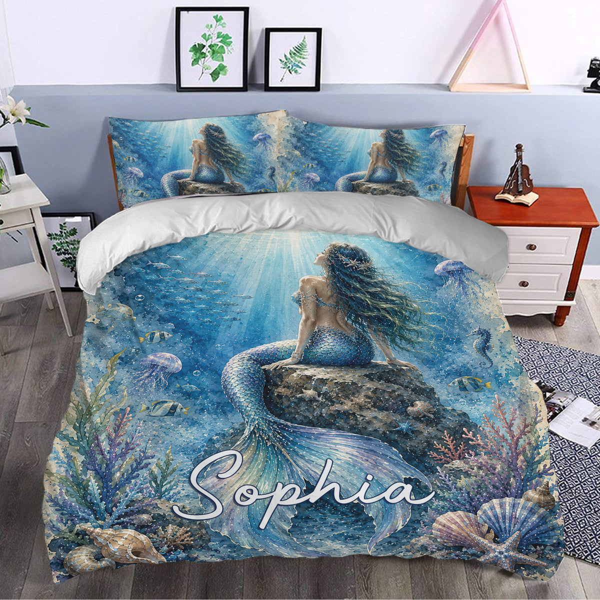 Mermaid duvet cover set styled in a bedroom with a blue underwater scene, coral, fish, and sea life