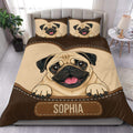 Pug duvet cover set displayed on a bed with a large cheerful pug portrait in warm brown and tan tones