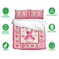 Breast cancer awareness pink ribbon bedding set shown with floral and butterfly artwork in a bedroom display