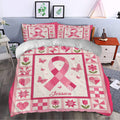 Breast cancer awareness bedding set styled on a bedroom bed with pink ribbons, butterflies, flowers, and hearts