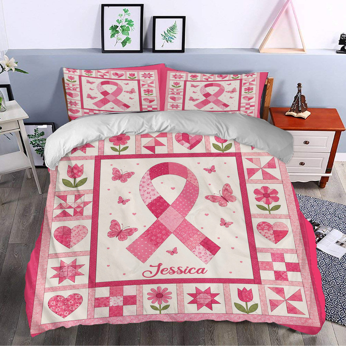 Breast cancer awareness bedding set styled on a bedroom bed with pink ribbons, butterflies, flowers, and hearts