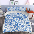 Blue diabetes duvet cover bedding set styled in a bright bedroom with floral awareness ribbon artwork