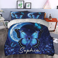 Blue diabetes awareness duvet cover bedding set styled in a bedroom with moonlit butterflies and floral details