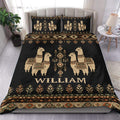 Black alpaca duvet cover set with geometric boho patterns, earthy borders, and matching pillowcases on a bed