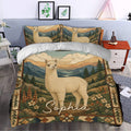 Alpaca duvet cover set styled in a bedroom with mountain landscape artwork, flowers, and woodland accents