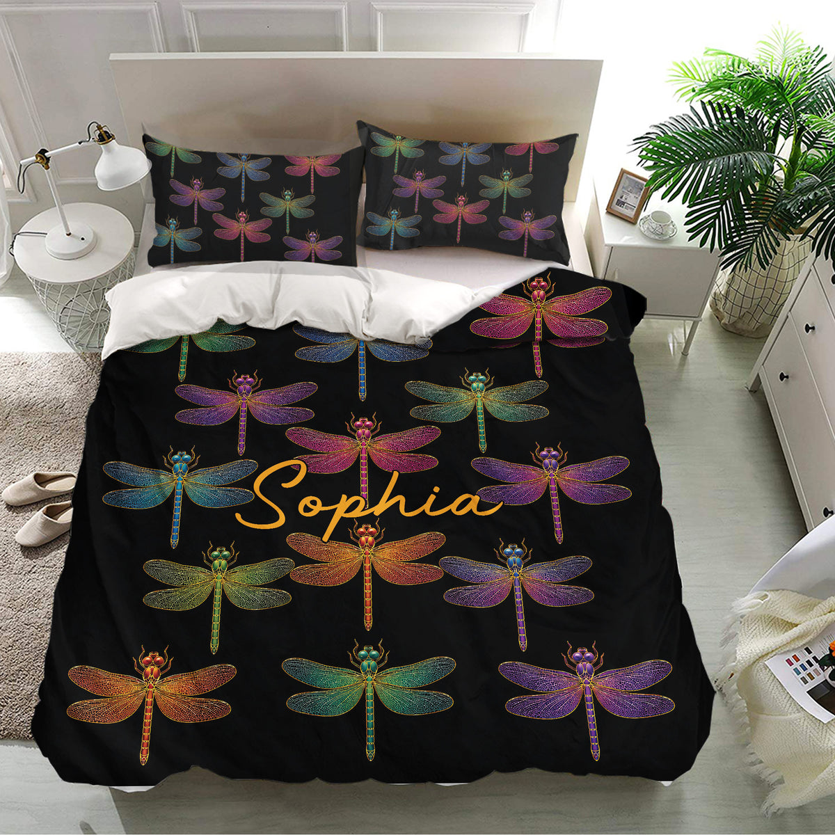Black dragonfly bedding set with jewel-tone artwork styled in a modern bedroom