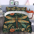Dragonfly duvet cover styled in a bedroom with oversized wings, flowers, and scrolling foliage artwork