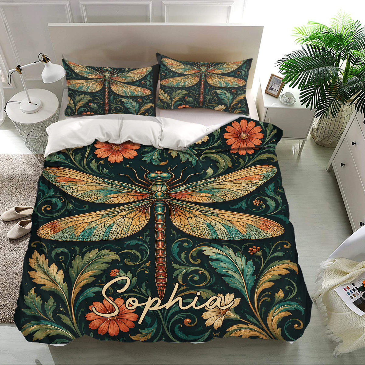 Ornate dragonfly bedding set presented in a bright bedroom with matching pillows and floral vintage-style artwork