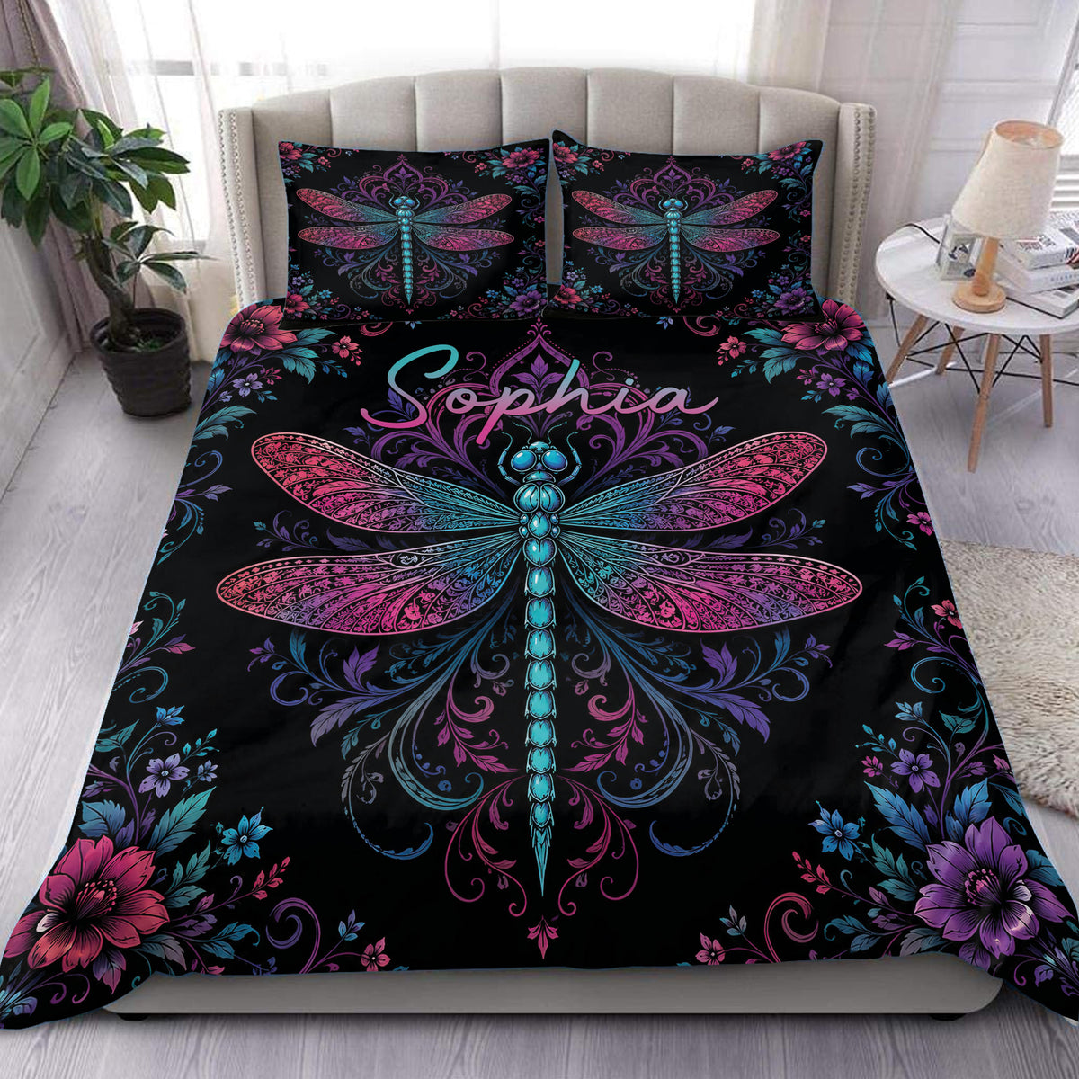 Dragonfly duvet cover set displayed on a bed with vivid pink, purple, and turquoise floral artwork
