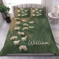 Green sheep duvet cover set styled on a bed with matching pillowcases and rustic pastoral artwork