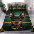 Miniature Pinscher duvet cover set with black and tan dog portrait, deep green geometric background, and gold trim