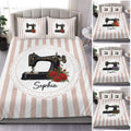 Sewing-themed duvet cover set with vintage machine, floral accents, and soft blush vertical stripes