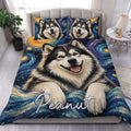 Alaskan Malamute duvet cover set displayed on a bed with blue, gold, and purple cosmic artwork