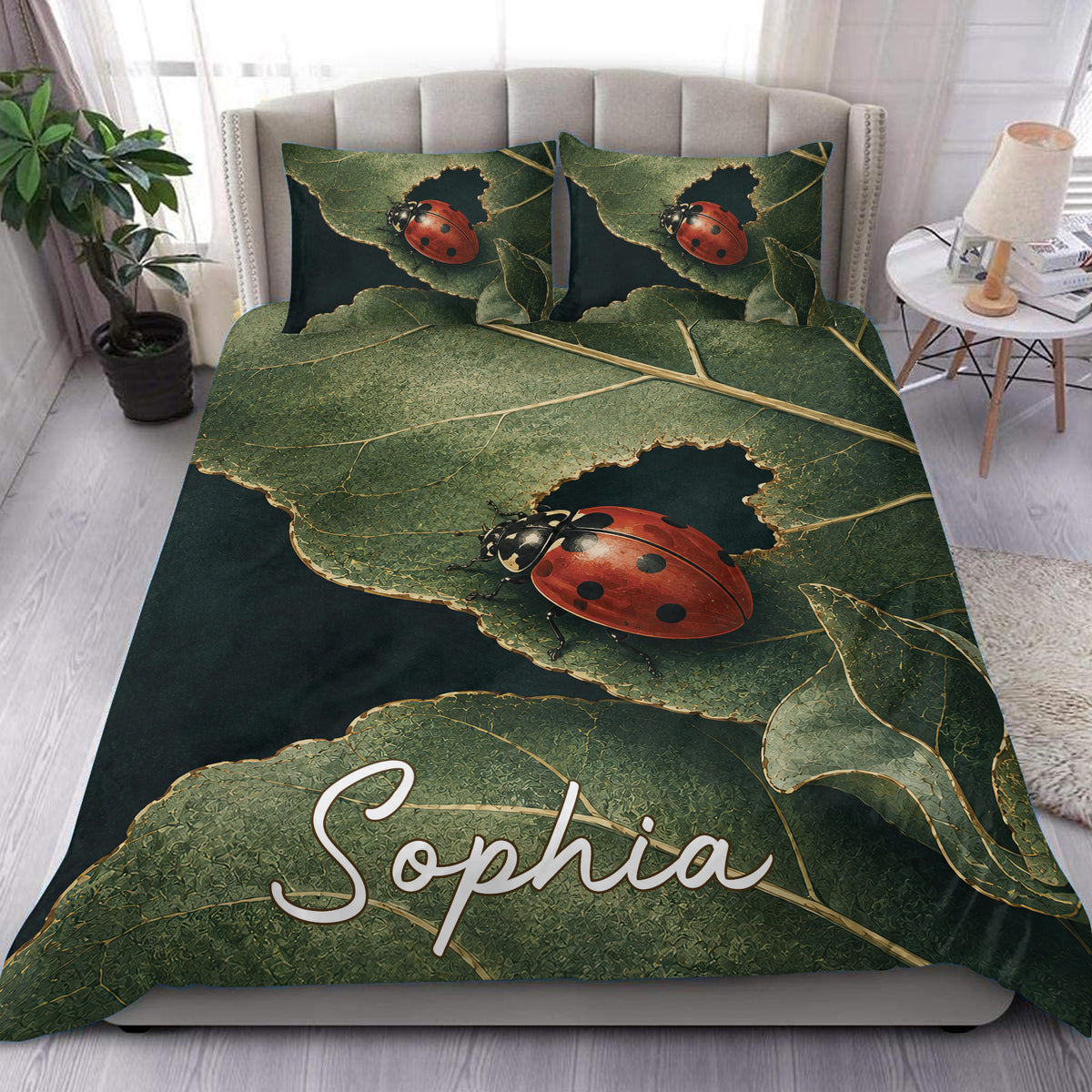 Ladybug duvet cover set displayed on a bed with red ladybugs, green leaves, and dark botanical accents