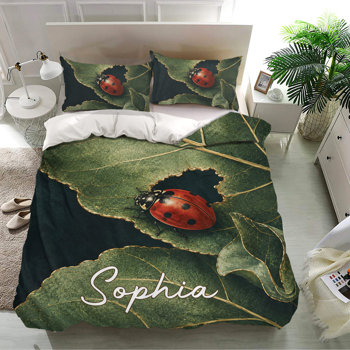 Ladybug bedding set presented in a bright bedroom with leafy green artwork and matching printed pillowcases