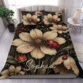 Ladybug duvet cover set displayed on a bed with cream flowers, red insects, and a dramatic black botanical background