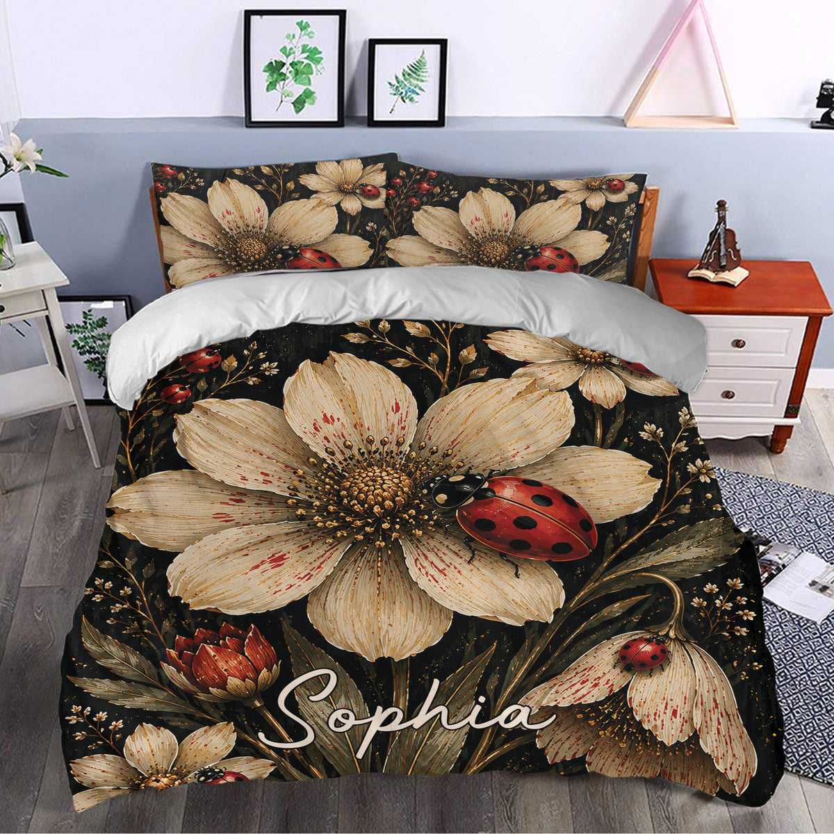 Ladybug duvet cover styled in a bedroom with oversized cream flowers, botanical leaves, and red insect details