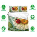 Ladybug bedding set with daisy artwork shown on a bed alongside soft breathable fabric and care icons