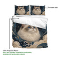 Ragdoll cat duvet cover and matching pillowcases displaying a richly illustrated blue and gold celestial design