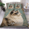 Ragdoll cat duvet cover set displayed on a bed with blue eyes, teal tones, and golden botanical accents
