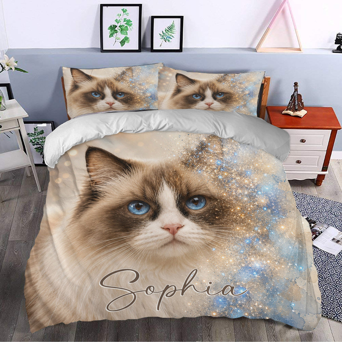 Ragdoll cat duvet cover set styled in a bedroom with a large blue-eyed cat portrait and celestial accents