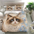 Ragdoll cat bedding set displayed in a bright bedroom with matching cat pillowcases and a galaxy-inspired design
