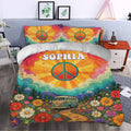 Colorful hippie bedding styled in a bedroom with peace symbols, floral artwork, and bohemian travel details