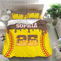 Softball duvet cover set displayed in a bright bedroom with yellow, brown, and multicolor artwork