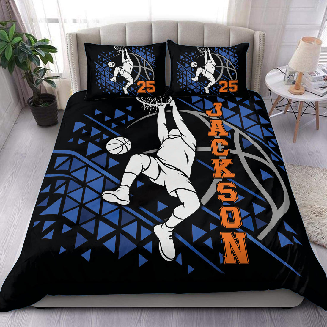Basketball duvet cover set displayed on a bed with a dunking player, black, blue, orange, and gray artwork