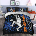 Basketball bedroom decor featuring a bold dunking player duvet cover with geometric graphics and vivid orange lettering