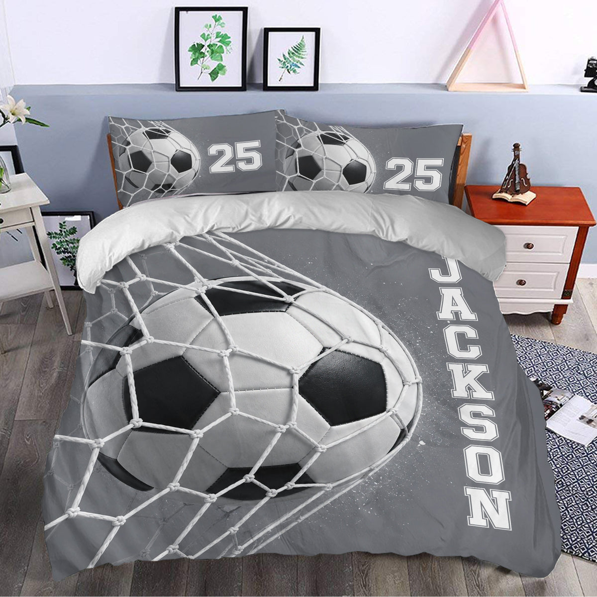 Soccer duvet cover set styled in a bedroom with a dramatic grayscale ball and goal net artwork