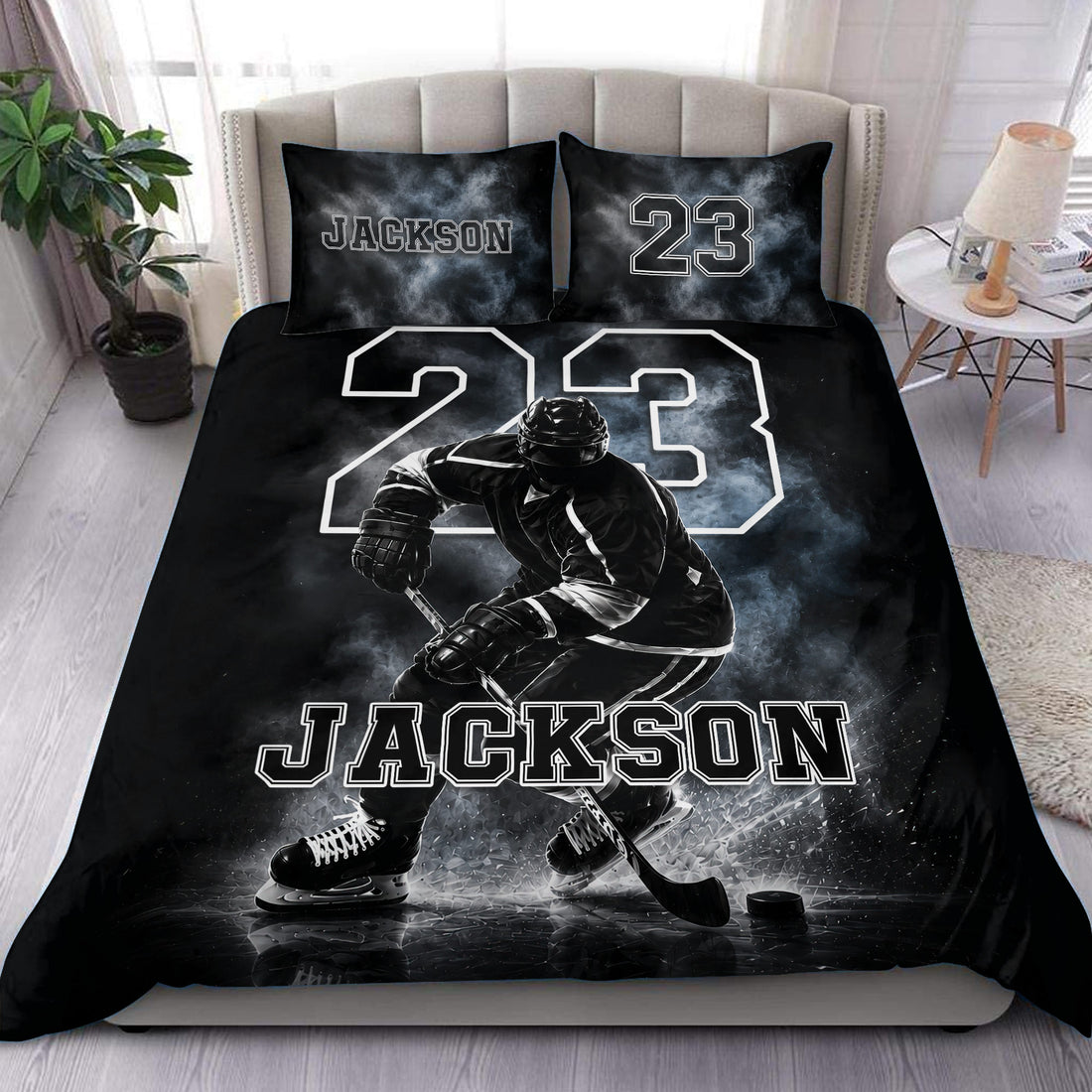 Black hockey duvet cover set displayed on a bed with an ice hockey player, rink scene, bold number, and custom lettering