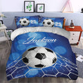 Blue soccer duvet cover set styled in a bedroom with soccer ball and goal net design