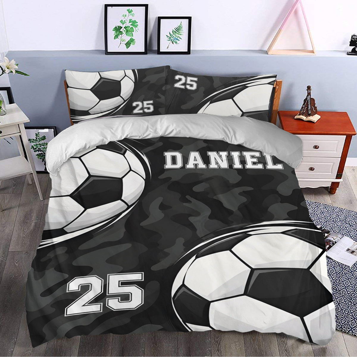 Custom soccer duvet cover styled in a bedroom with oversized soccer balls and black camouflage accents