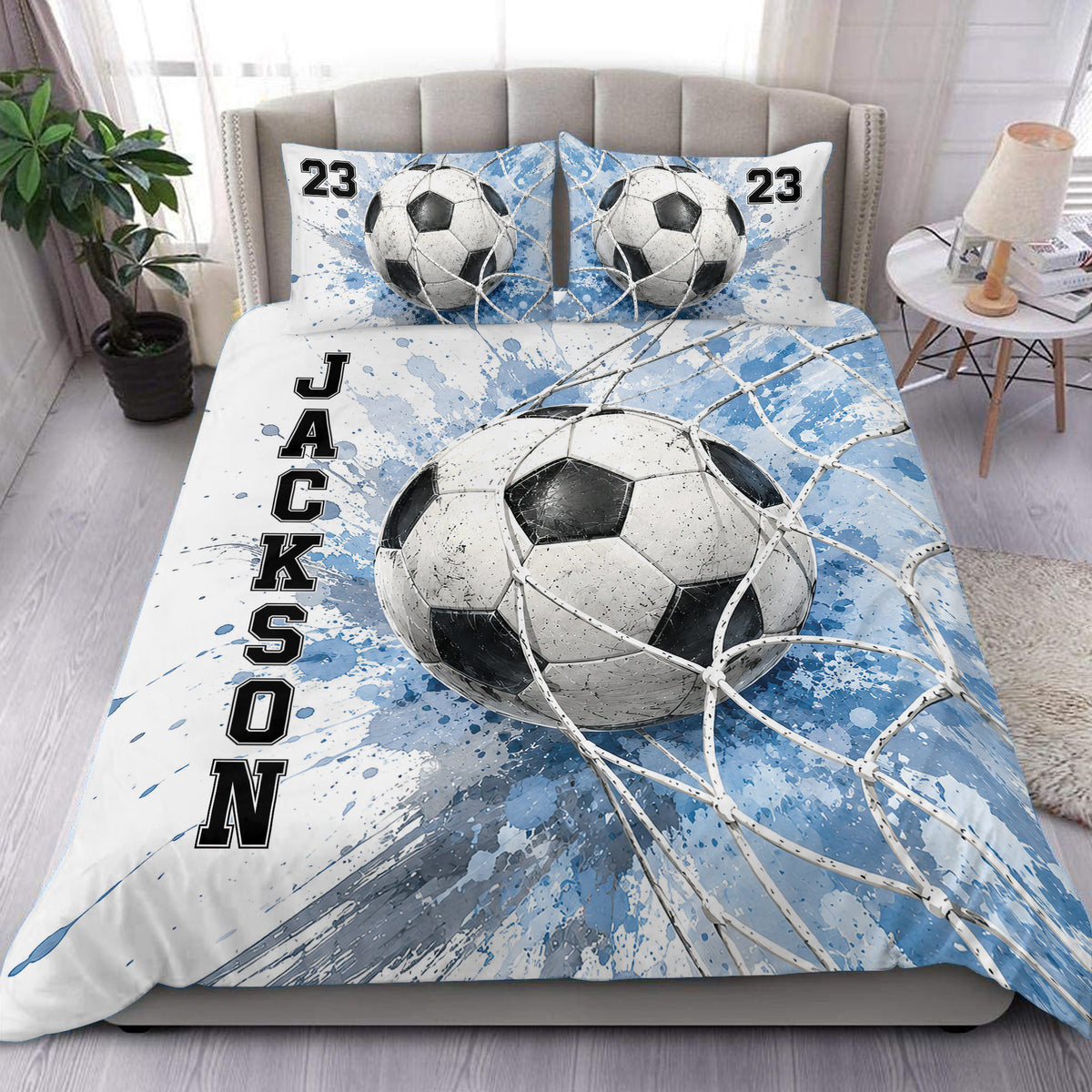Soccer duvet cover set with oversized soccer balls, blue paint splashes, and bedroom styling