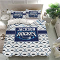 Hockey duvet cover displayed in a modern bedroom with matching pillowcases and puck pattern