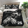 Soccer duvet cover bedding set displayed on a bed with black graphic artwork, soccer ball, gloves, and matching pillows