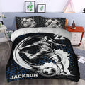 Black and blue soccer duvet cover set styled in a bedroom with action player artwork and matching pillows