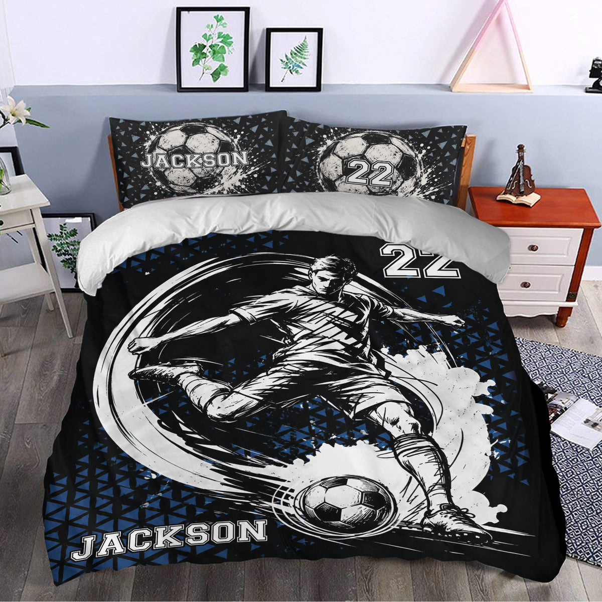 Black and blue soccer duvet cover set styled in a bedroom with action player artwork and matching pillows