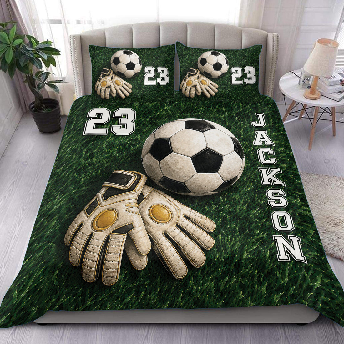 Soccer duvet cover set displayed on a bed with a green field design, soccer ball, and goalkeeper gloves