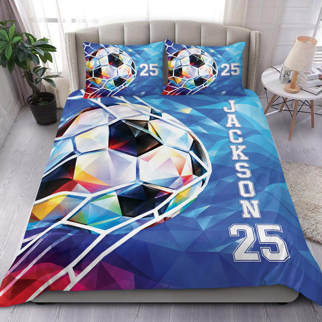 Blue soccer duvet cover set displayed on a bed with colorful geometric soccer ball artwork